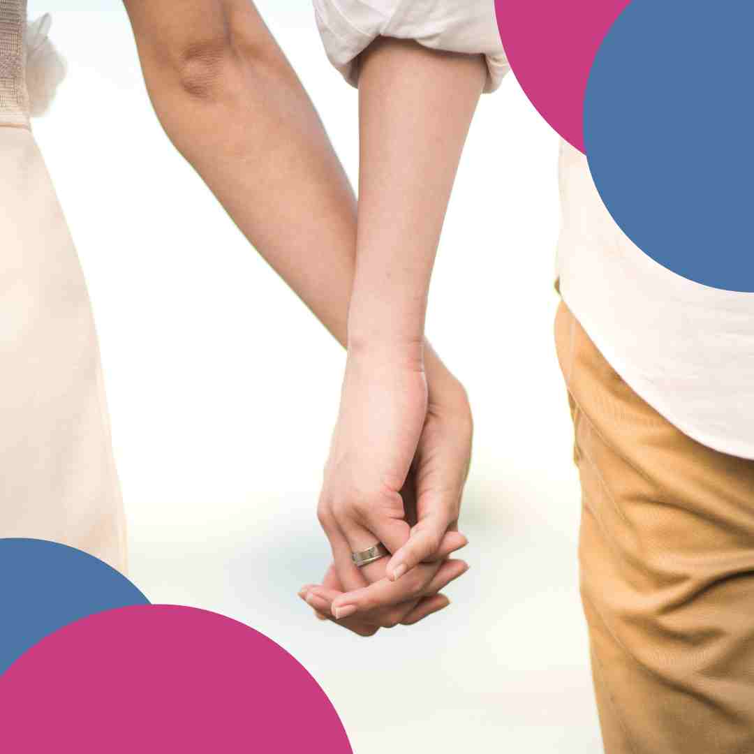 Couple holding hands