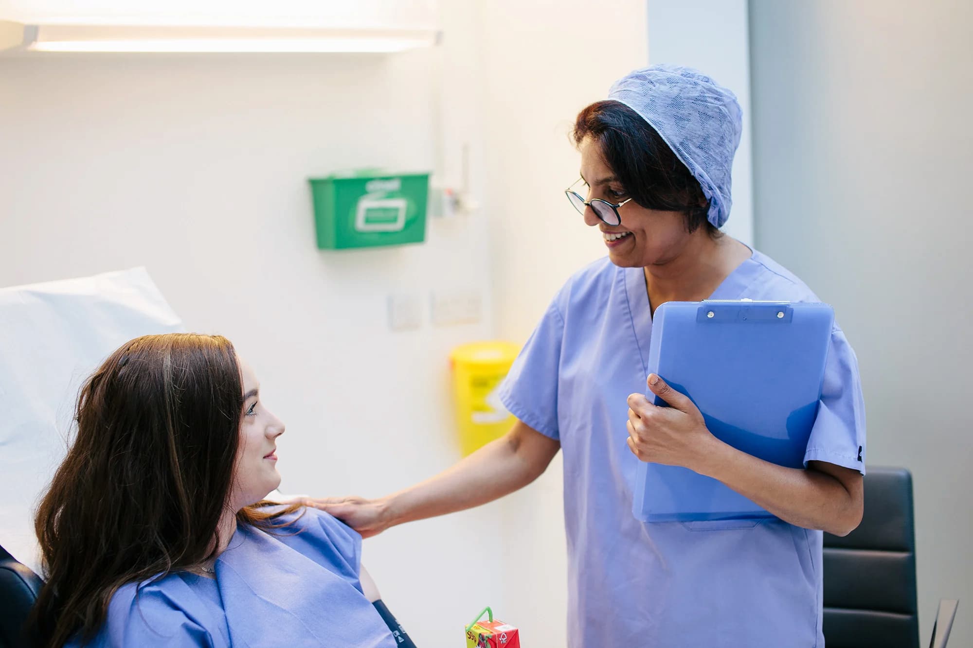 IVF Doctor talking to a patient